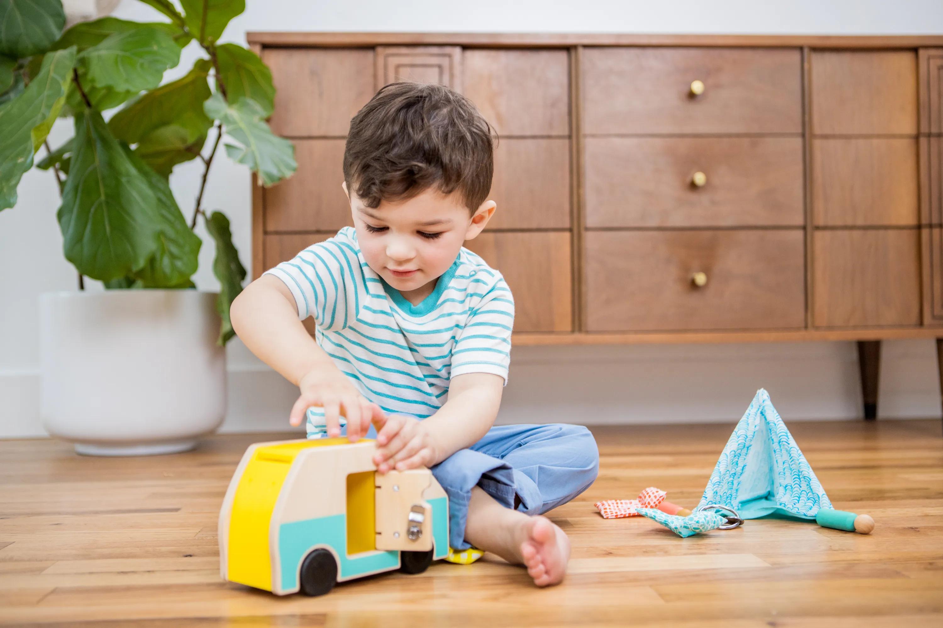  boy playing with Lovevery toys